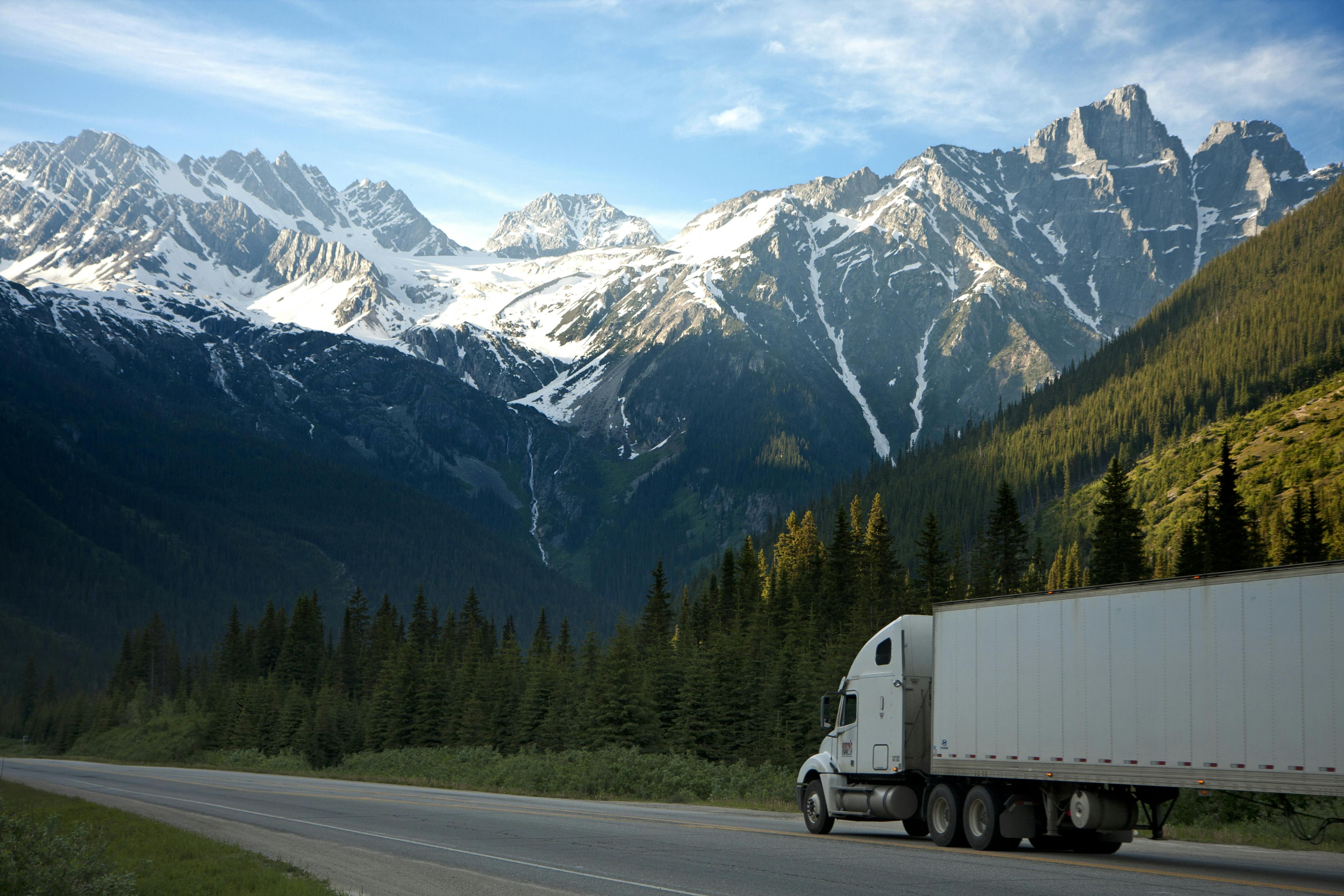 A Dark Horse Movers truck on an open highway